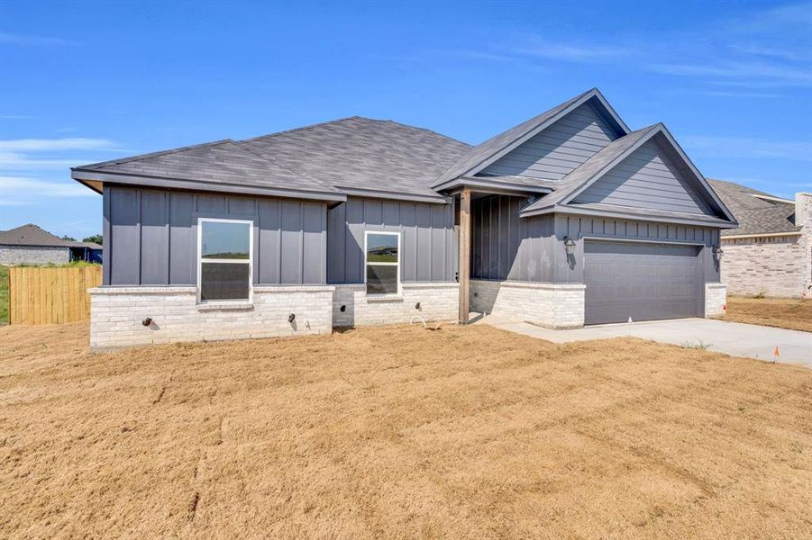 Front exterior of a new home in , Palmer, TX, highlighting curb appeal (Image 24). Front exterior of a new home in , Palmer, TX, highlighting curb appeal (Image 24).