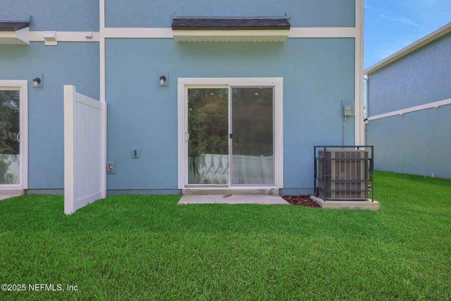 Front exterior of a new home in Kasen Oaks, Jacksonville, FL, highlighting curb appeal (Image 18).