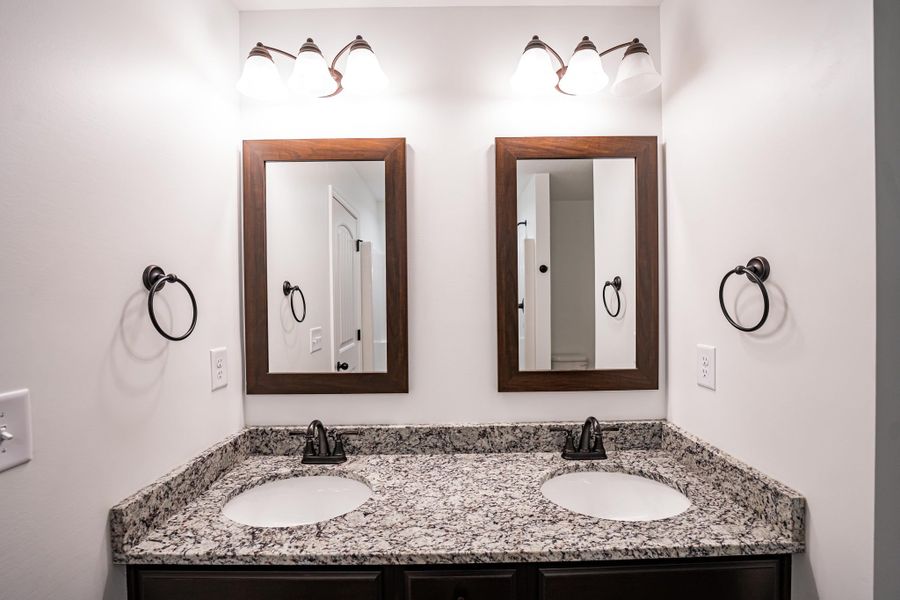 Representative interior finishes for a home built from the Sumter by Enchanted Homes in Lonesome Dove, San Antonio (Image 24).