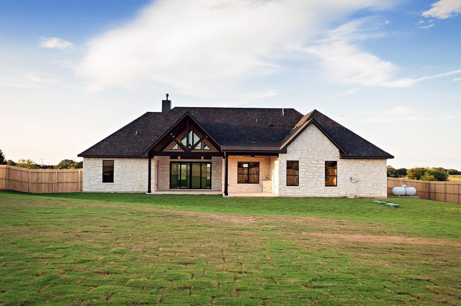 Front exterior of a new home in , Salado, TX, highlighting curb appeal (Image 24). Front exterior of a new home in , Salado, TX, highlighting curb appeal (Image 24).