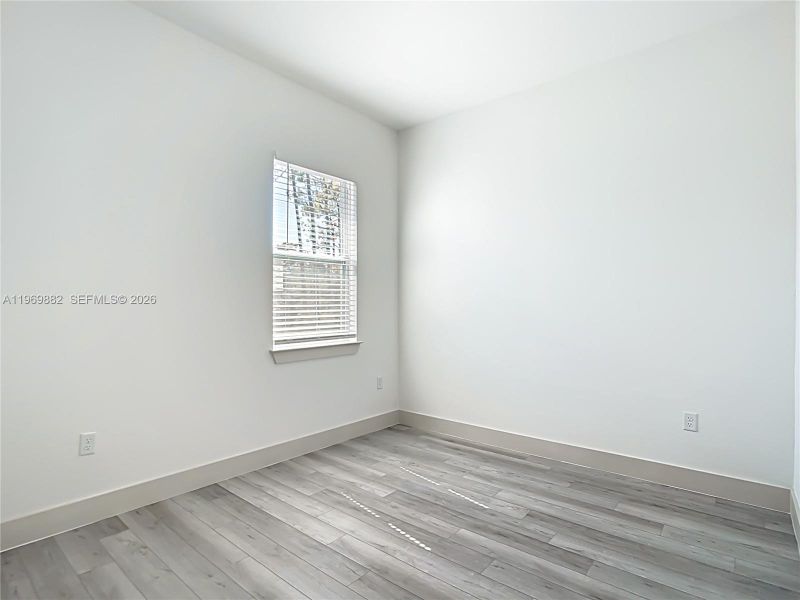Spacious, unfurnished interior of a new home in , Port Charlotte (Image 40).