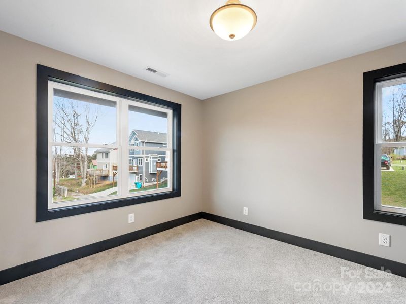 2nd Bedroom with large windows