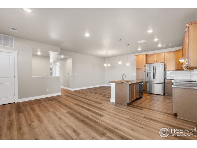 Upgraded extended luxury vinyl flooring throughout