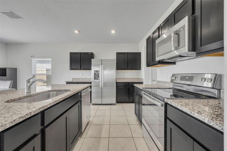 Furnished interior view inside a new home in , Haines City (Image 31).