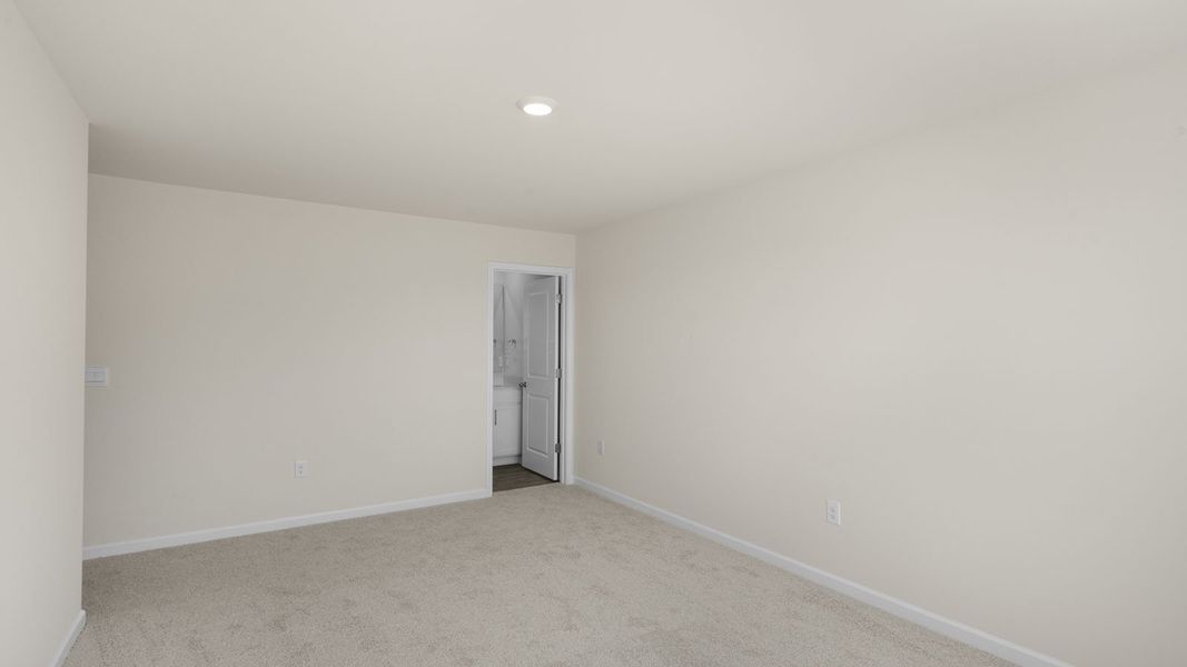 Representative unfurnished interior of a home built from the Pearson by D.R. Horton in The Townes at Ridgewood Farms, Winterville (Image 20).