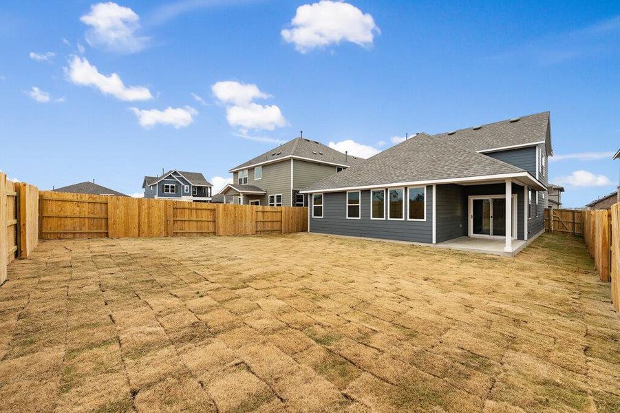 Exterior details and patio area of a home in Patterson Ranch, Georgetown (Image 23).