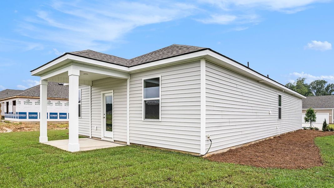 Exterior details and patio area of a home in The Bluffs at Mill Creek, Florence (Image 4).