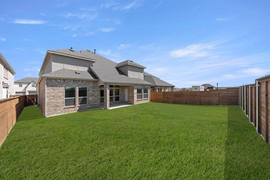 Exterior details and patio area of a home in Solterra, Mesquite (Image 22).