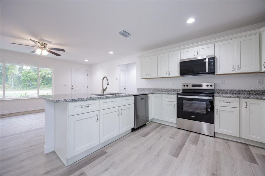 Furnished interior view inside a new home in , Williston (Image 8).