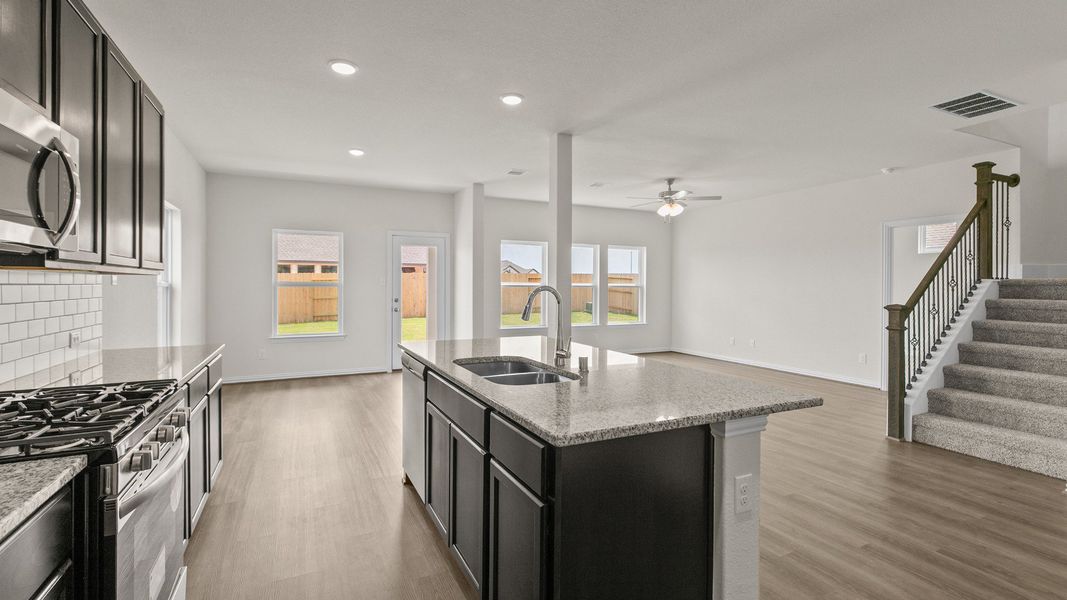 Representative furnished interior of a home built from the Southfork by Brightland Homes in Sunterra, Katy (Image 9).