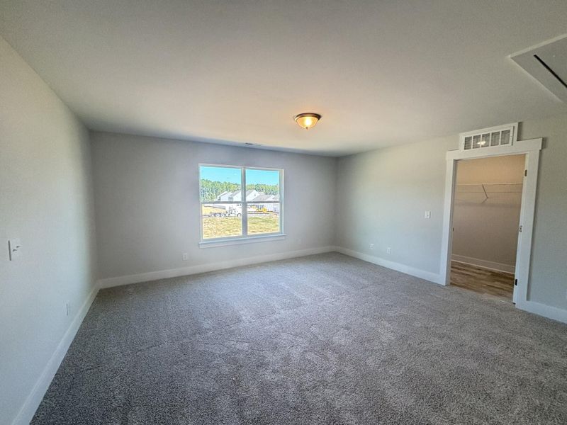 Spacious, unfurnished interior of a new home in Daniel Farms, Benson (Image 27).