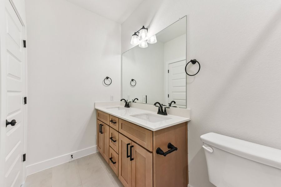 Furnished interior view inside a new home in Koenig Townhomes, Austin (Image 16).