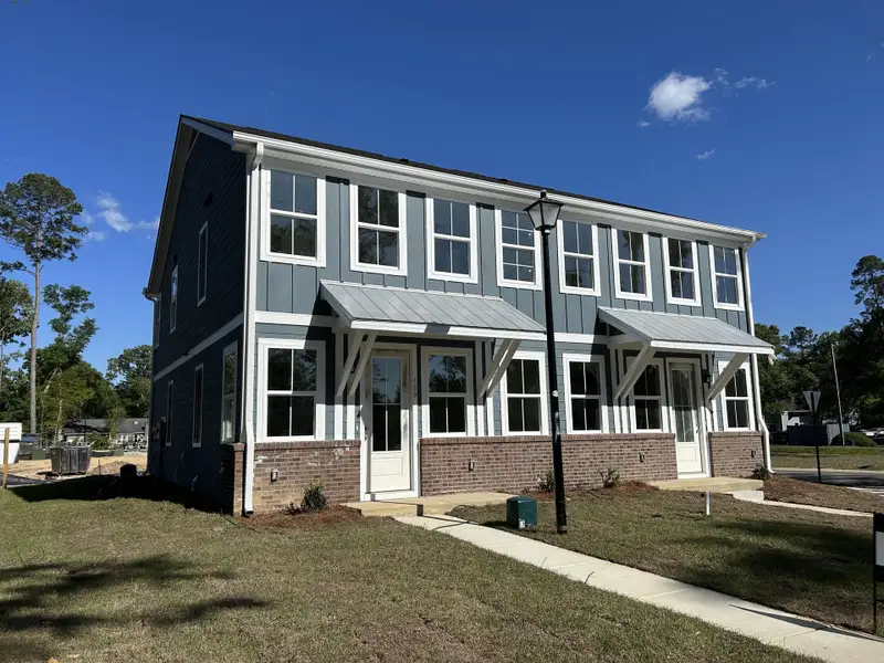 Front exterior of a new home in , Summerville, SC, highlighting curb appeal (Image 1). Front exterior of a new home in , Summerville, SC, highlighting curb appeal (Image 1).