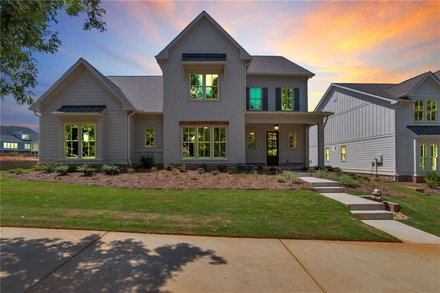 Front exterior of a new home in , Statham, GA, highlighting curb appeal (Image 24).