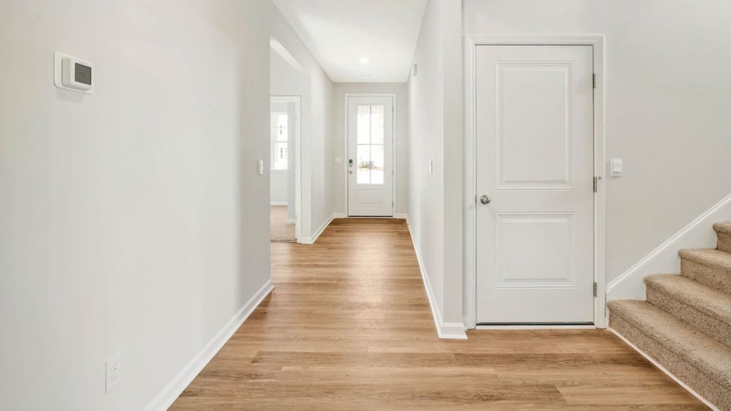 Representative unfurnished interior of a home built from the DARBY by D.R. Horton in Grayson Park, Leland (Image 15).