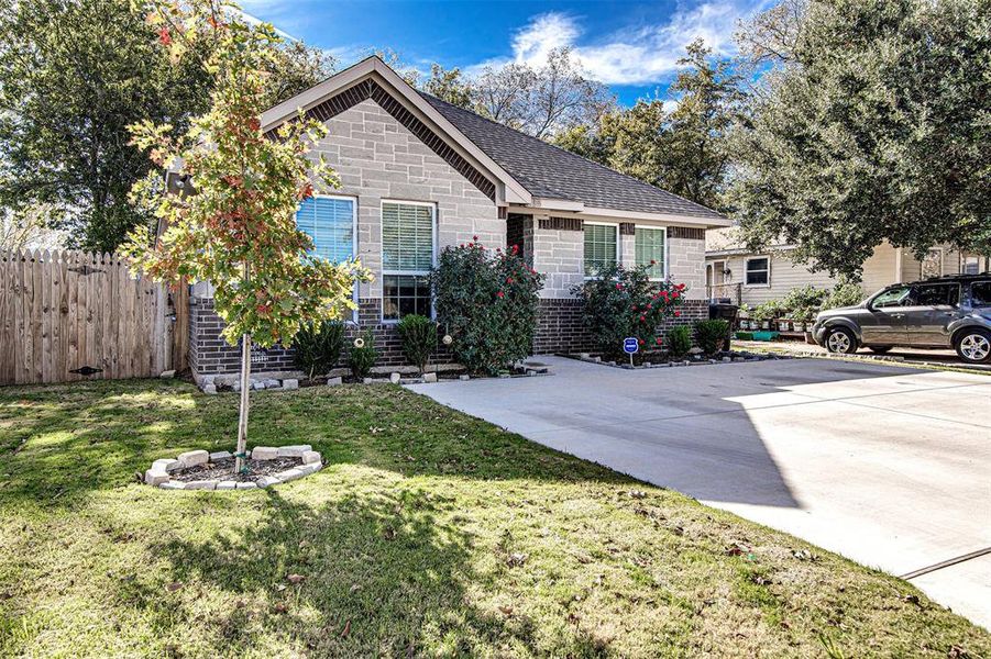 View of front of home with a front lawn