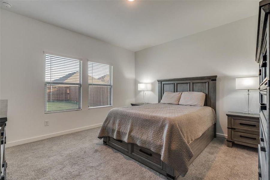 Bedroom with light colored carpet Bedroom with light colored carpet