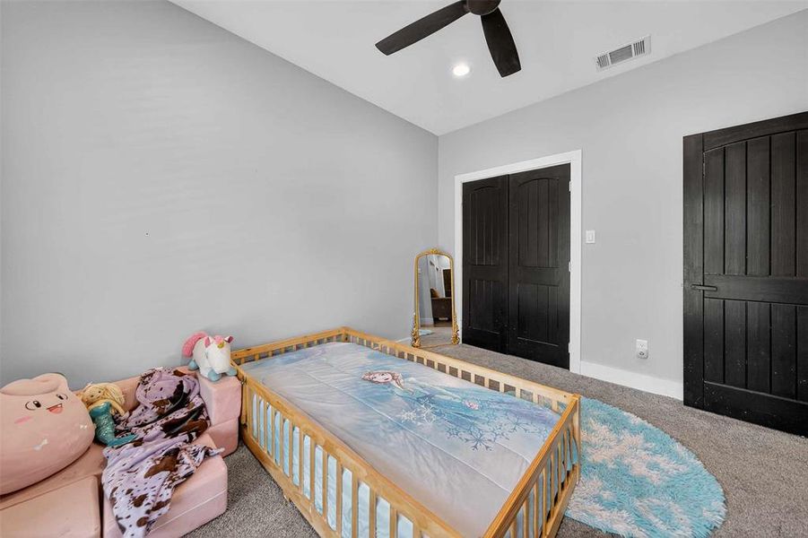 Carpeted bedroom featuring a closet, ceiling fan, and recessed lighting Carpeted bedroom featuring a closet, ceiling fan, and recessed lighting