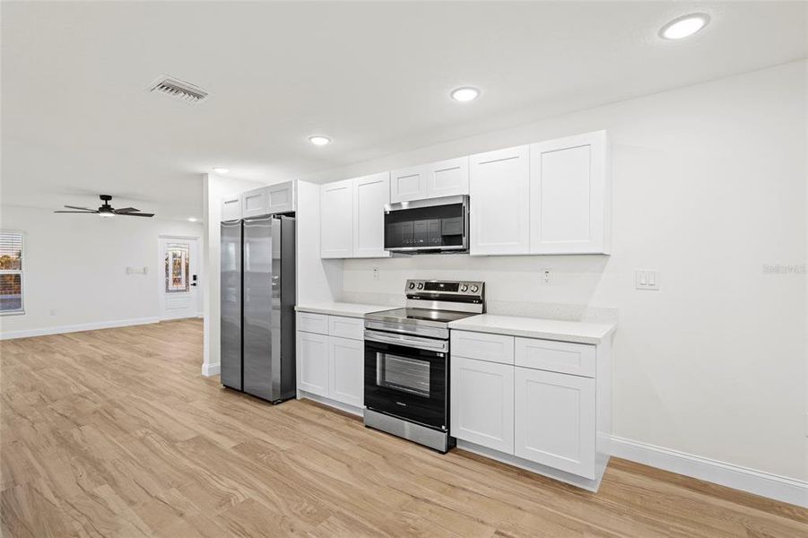 Furnished interior view inside a new home in , Okeechobee (Image 13).