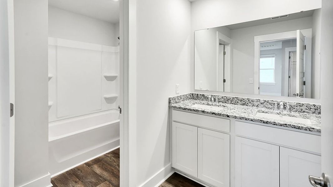 Furnished interior view inside a new home in The Landing at Sidbury Station, Castle Hayne (Image 11).