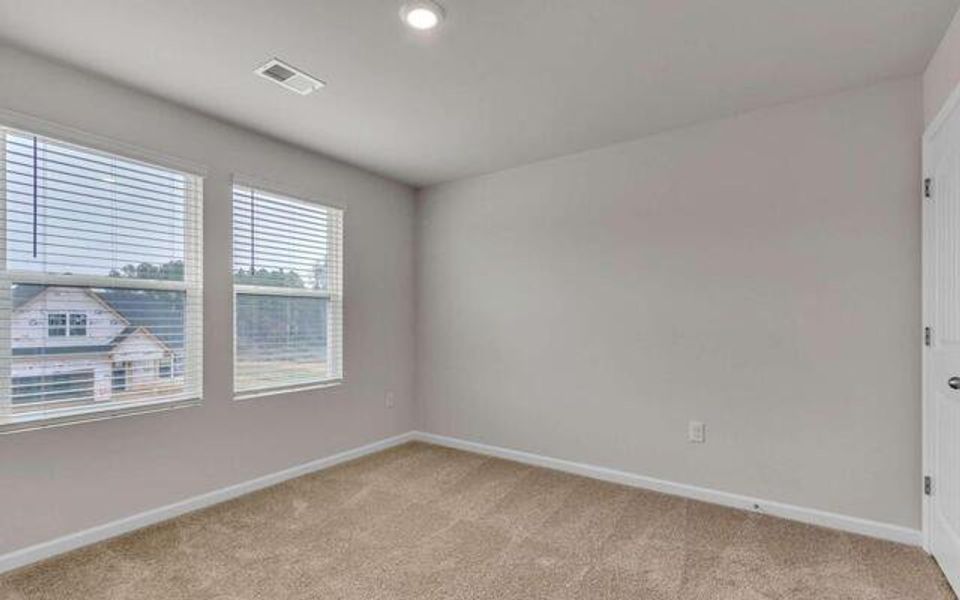 Spacious, unfurnished interior of a new home in River Walk Farm, Covington (Image 17).