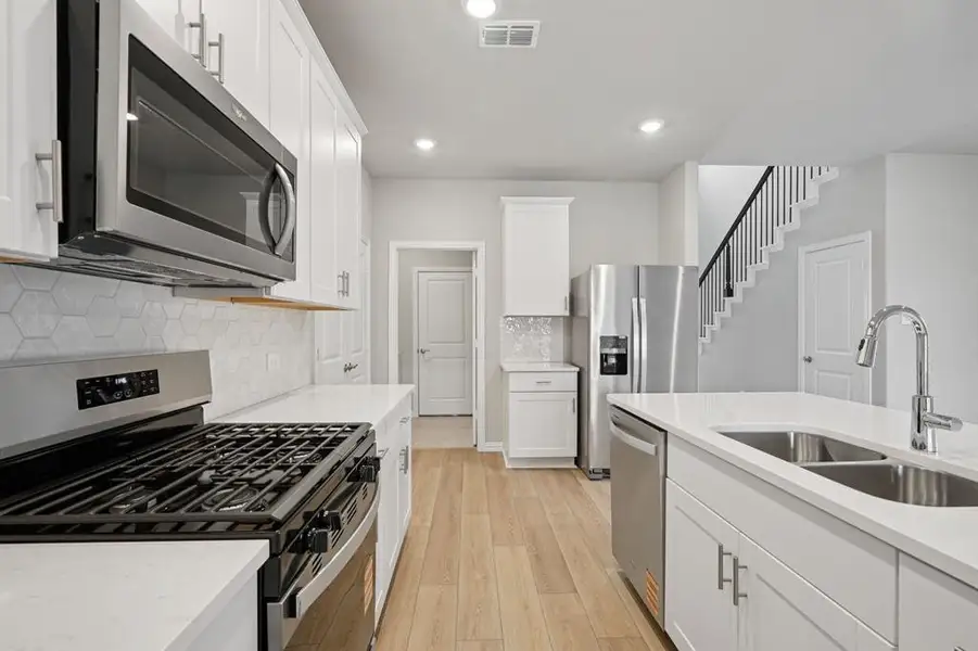 Photo is not of the actual home, but is an inspirational photo of builder’s model home and may depict options, furnishings, and/or decorator features that are not included.