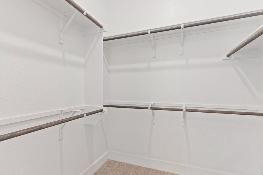 Representative unfurnished interior of a home built from the Waterville by Ashton Woods in The Trails at Carmel, Pflugerville (Image 50).