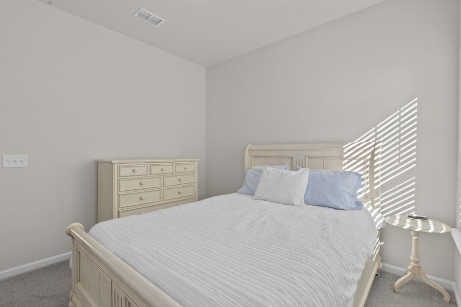 Furnished interior view inside a new home in K. Hovnanian's® Four Seasons at Lakes of Cane Bay, Summerville (Image 26). Furnished interior view inside a new home in K. Hovnanian's® Four Seasons at Lakes of Cane Bay, Summerville (Image 26).