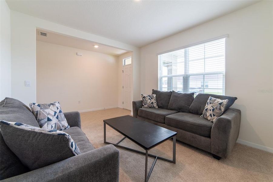 Furnished interior view inside a new home in , Harmony (Image 44).