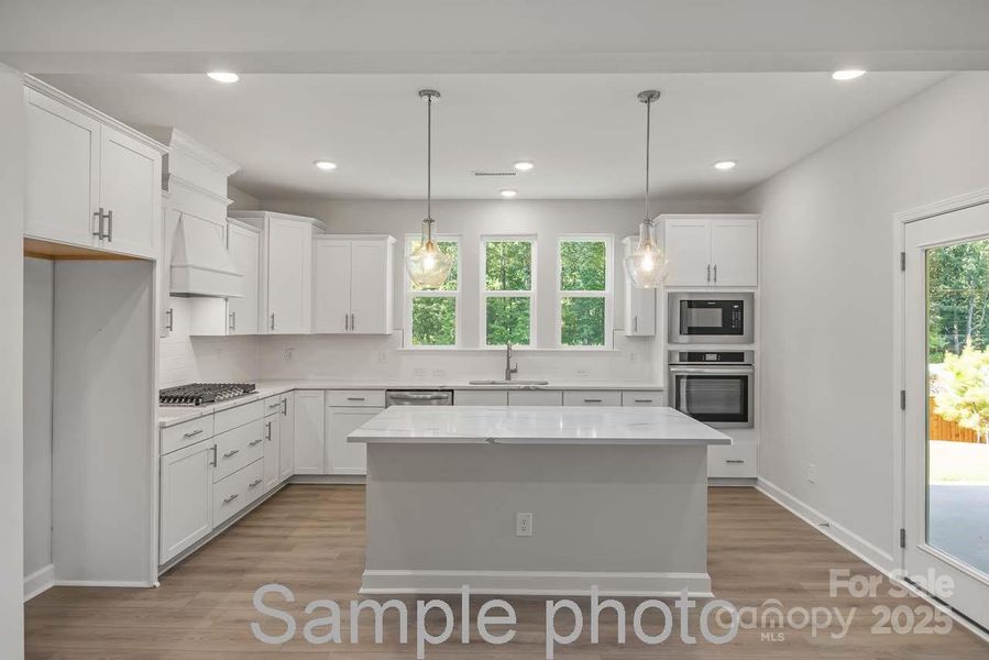 Furnished interior view inside a new home in Enclave at Belmont, Belmont (Image 4).
