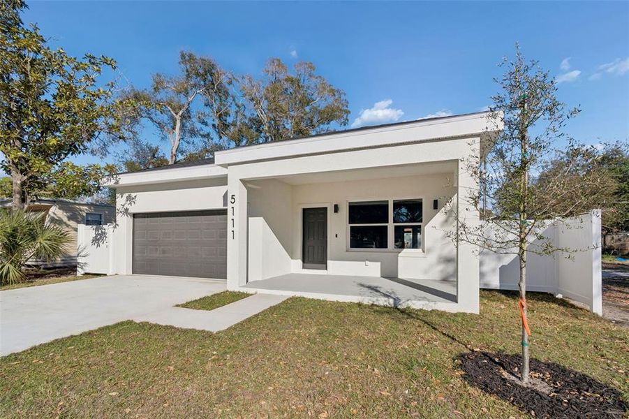 Front exterior of a new home in , St. Petersburg, FL, highlighting curb appeal (Image 30). Front exterior of a new home in , St. Petersburg, FL, highlighting curb appeal (Image 30).