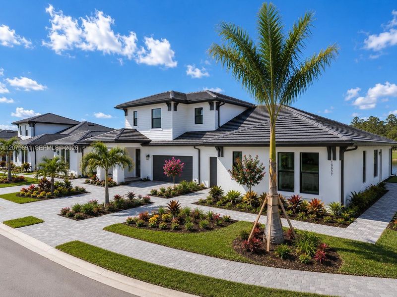 Front exterior of a new home in , Fort Myers, FL, highlighting curb appeal (Image 1). Front exterior of a new home in , Fort Myers, FL, highlighting curb appeal (Image 1).