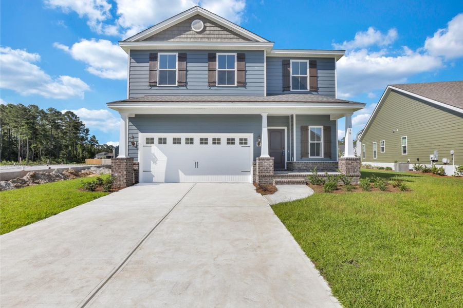 Representative exterior photo of a completed home built from the Seabrook by Ernest Homes in Wexford, Richmond Hill, GA (Image 31).