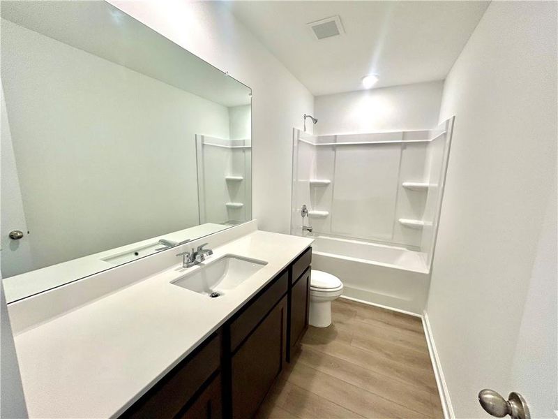 Furnished interior view inside a new home in The Pointe at Heron Bay, Locust Grove (Image 6).