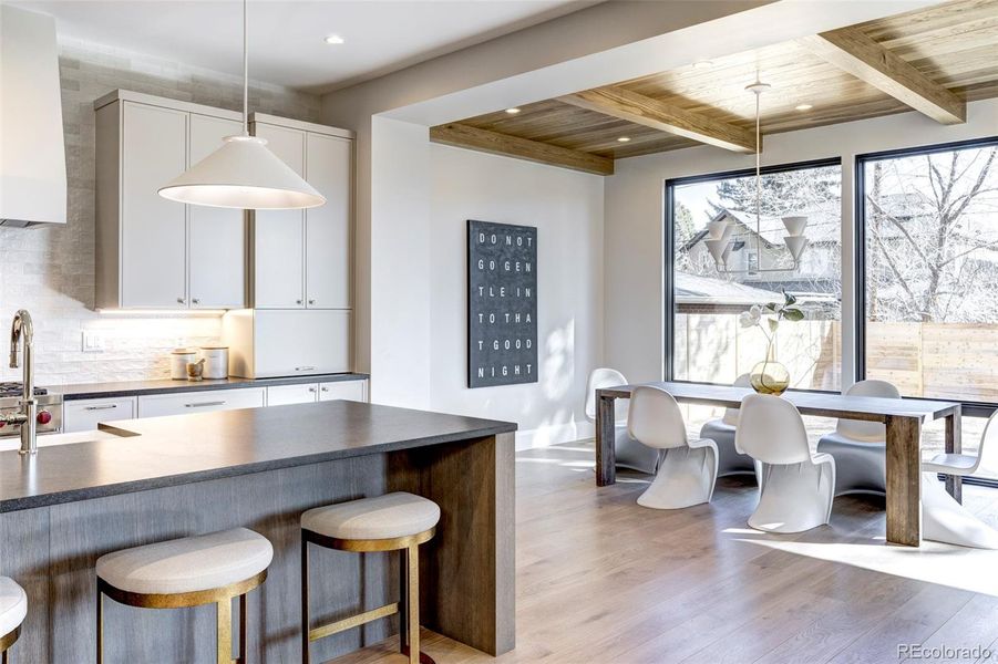 Sunny dining space open to kitchen and living space