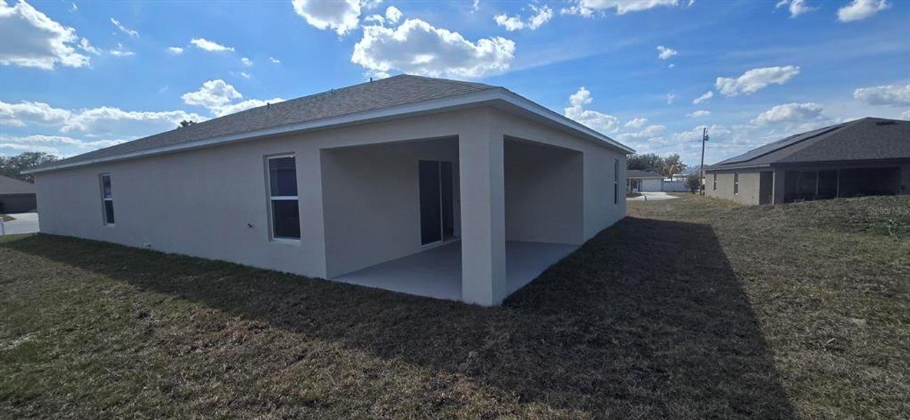 Exterior details and patio area of a home in Poinciana, Poinciana (Image 11).