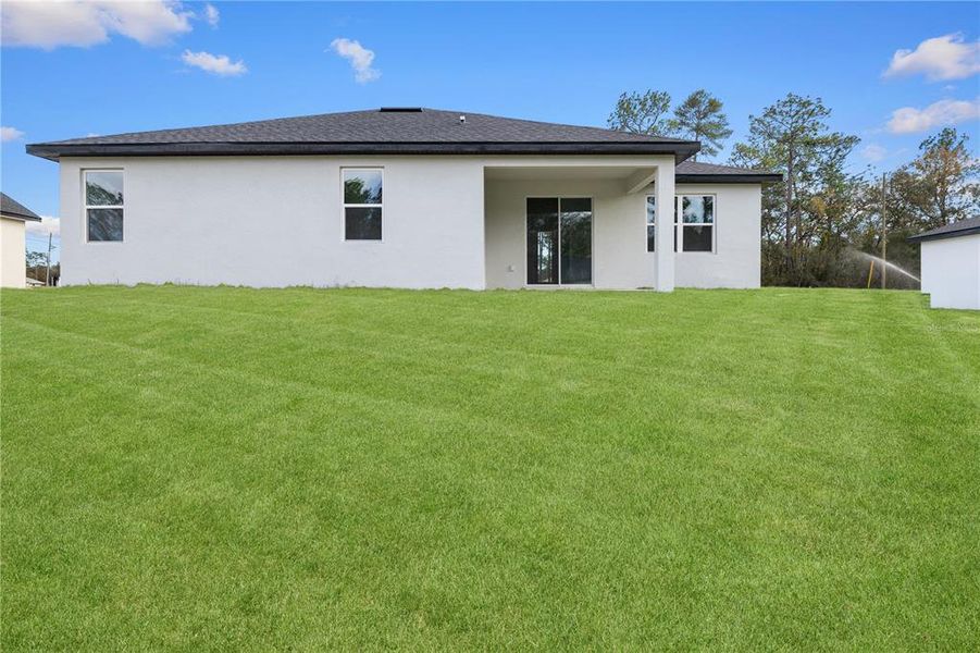 Exterior details and patio area of a home in , Ocala (Image 18).