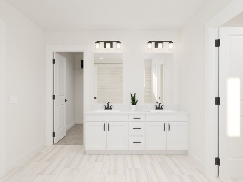 The primary bathroom offers dual vanity sinks and a walk-in shower.