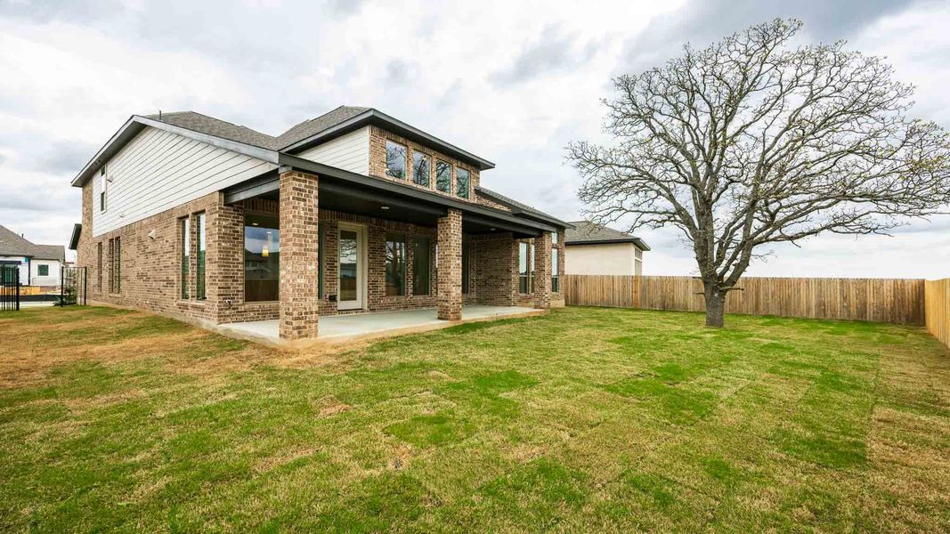 Exterior details and patio area of a home in Santa Rita Ranch - Eldorado, Liberty Hill (Image 2).