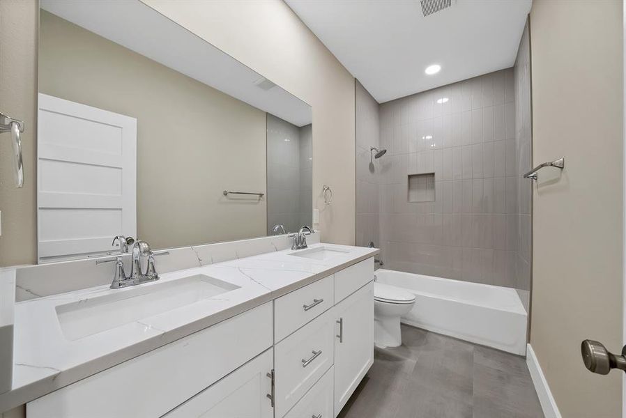 Furnished interior view inside a new home in , The Colony (Image 13).