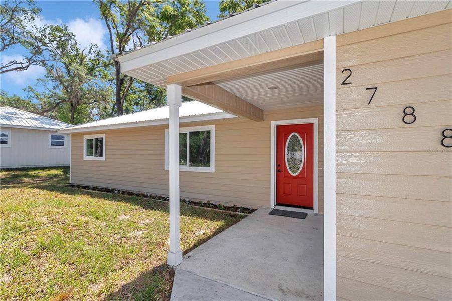 Front exterior of a new home in , Dunnellon, FL, highlighting curb appeal (Image 21).