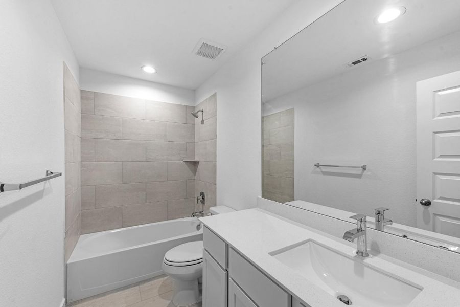 Furnished interior view inside a new home in Grand Mason Crossing, Katy (Image 10).