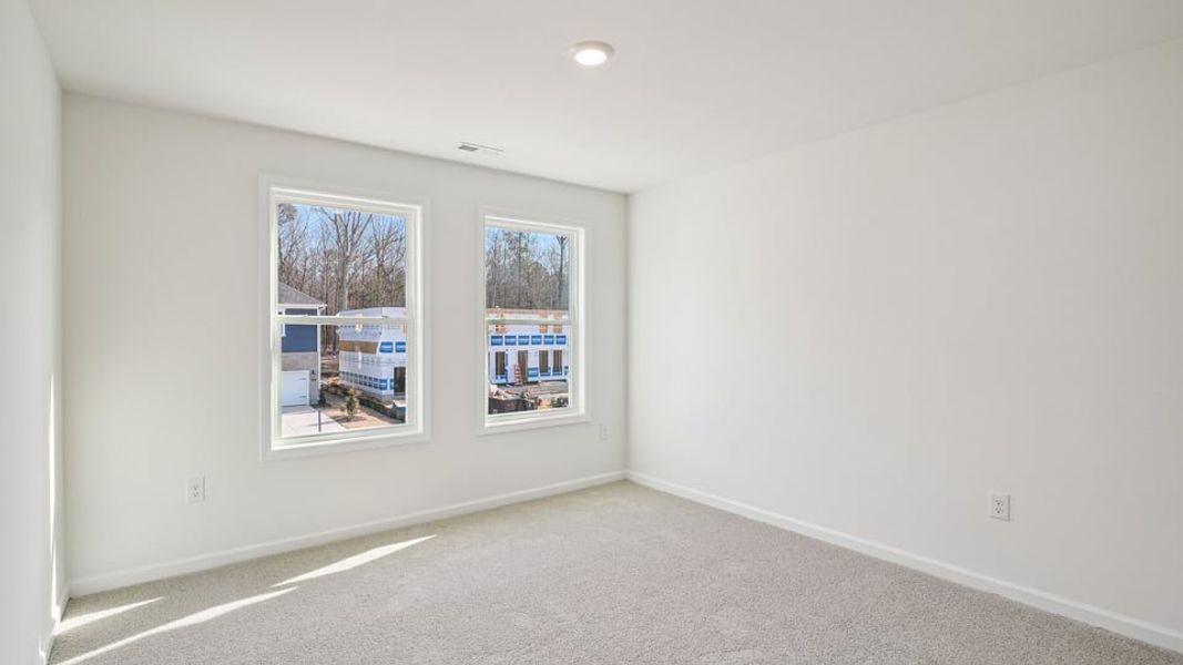 Spacious, unfurnished interior of a new home in Eagle Creek, Fuquay Varina (Image 25). Spacious, unfurnished interior of a new home in Eagle Creek, Fuquay Varina (Image 25).