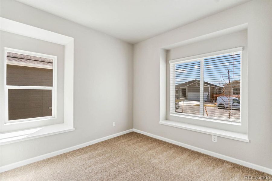Spacious, unfurnished interior of a new home in Second Creek Farm, Commerce City (Image 13).