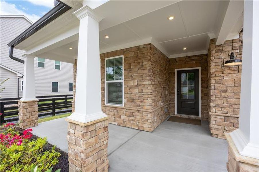 Exterior details and patio area of a home in Hillside Manor, Powder Springs (Image 3).