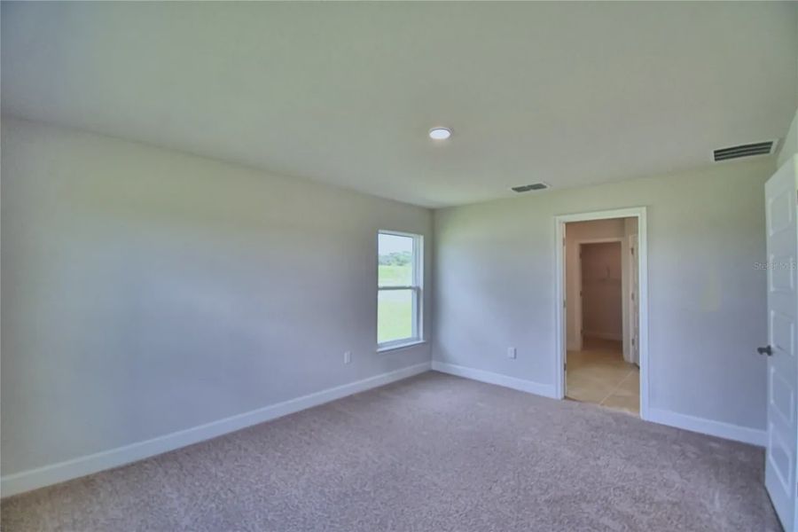 Spacious, unfurnished interior of a new home in Cadence Crossing, Auburndale (Image 30).