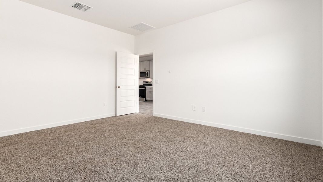 Spacious, unfurnished interior of a new home in Barnett Village, Marana (Image 28).