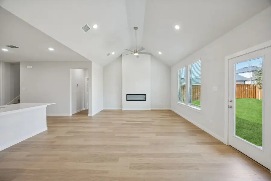 Living and Dining Rooms in the Masters home plan by Trophy Signature Homes – REPRESENTATIVE PHOTO