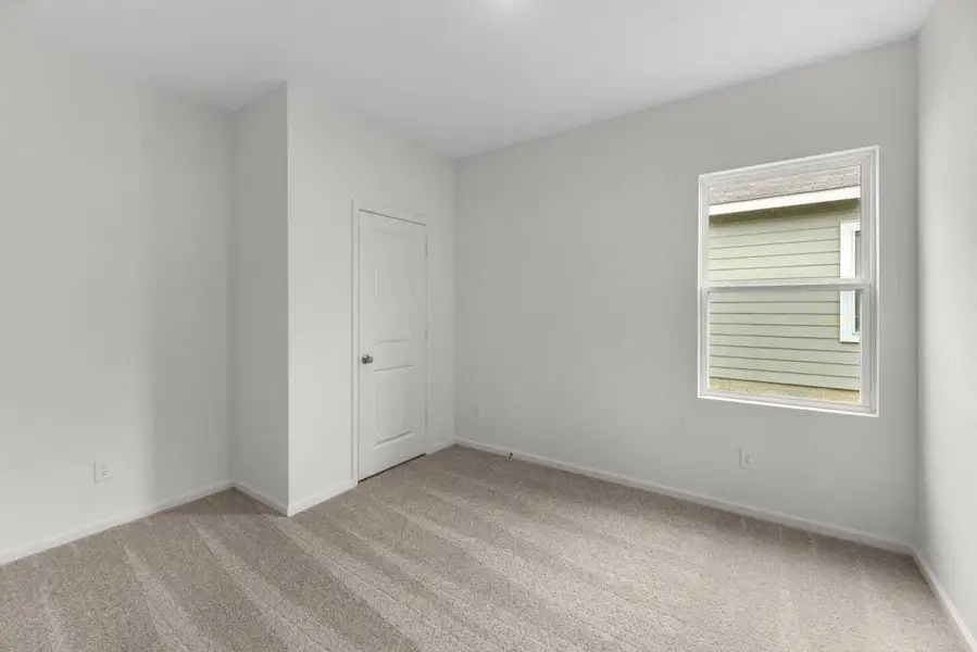 Spacious, unfurnished interior of a new home in Williams Landing, Waller (Image 15).