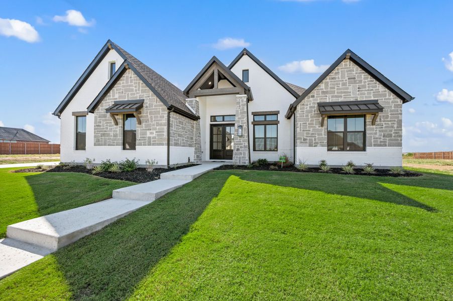 Front exterior of a new home in NorthGlen, Haslet, TX, highlighting curb appeal (Image 28).